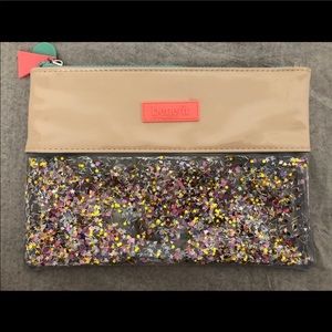 Benefit sparkling purse/ make up bag.